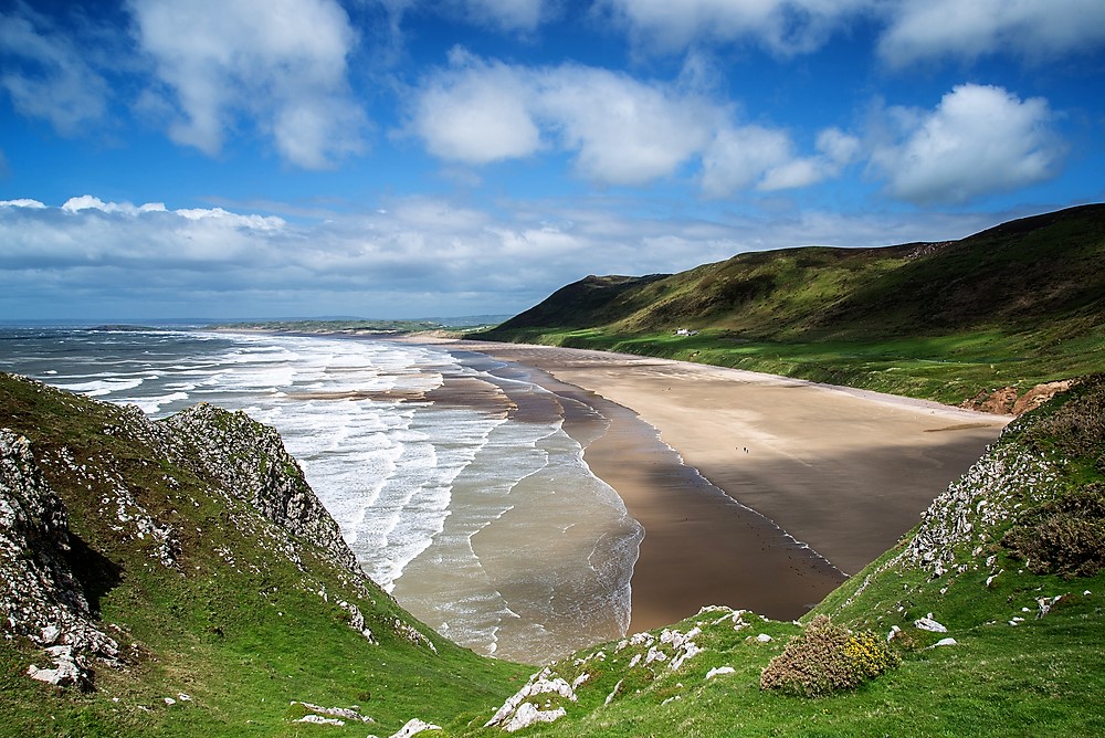 Best Vacation Spots for Teens
Beautiful Summer landscape of Rhosilli Bay beach in Wales