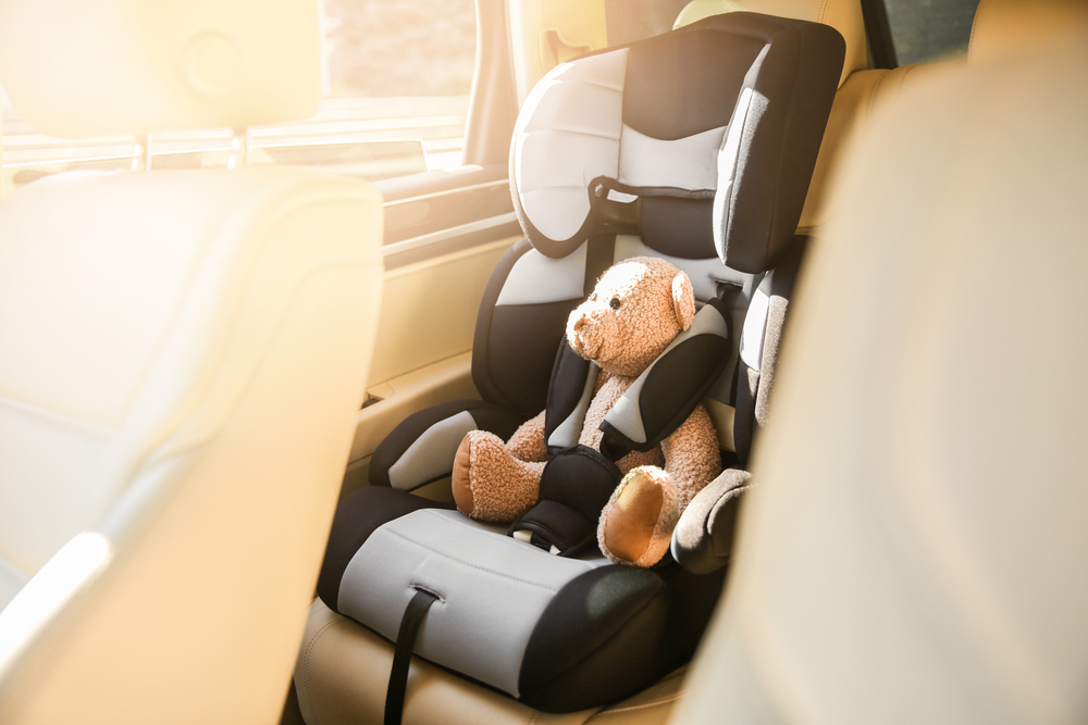 Summer Vacation Safety Tips.
Safety car seat for baby  with teddy bear