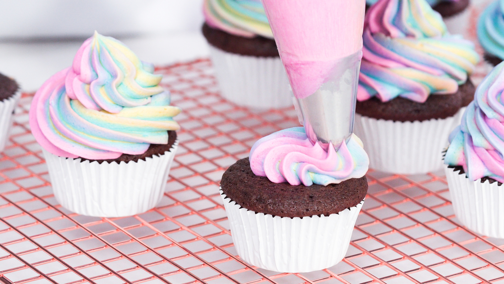 Summer Staycation Ideas.
Step by step. Frosting unicorn chocolate cupcakes with rainbow color buttercream frosting.