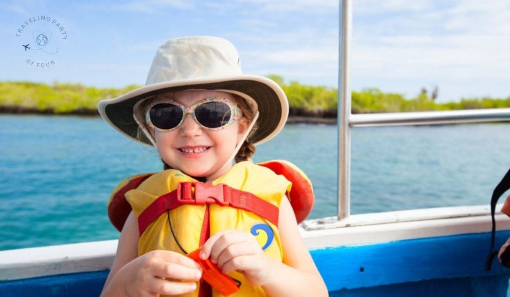 Kid with life vest on a boat.
Travel Blog Post Ideas.
