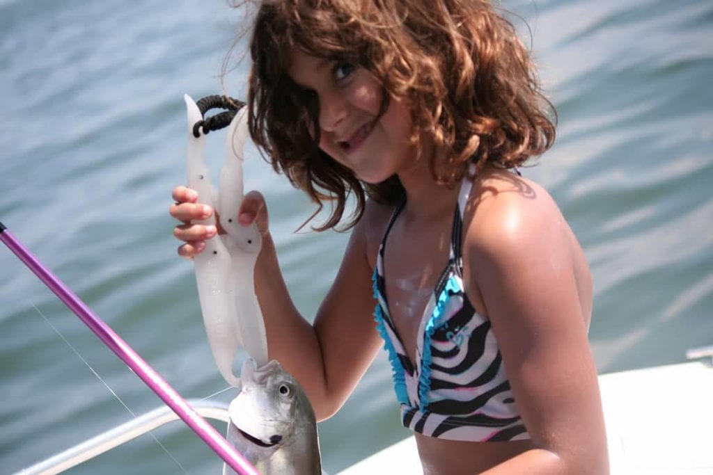 Summer staycation ideas.
Happy little girl with a fish.
