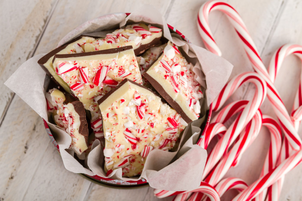 Christmas Bucket List Ideas.
Display of homemade chocolate peppermint bark with bunch of candy canes