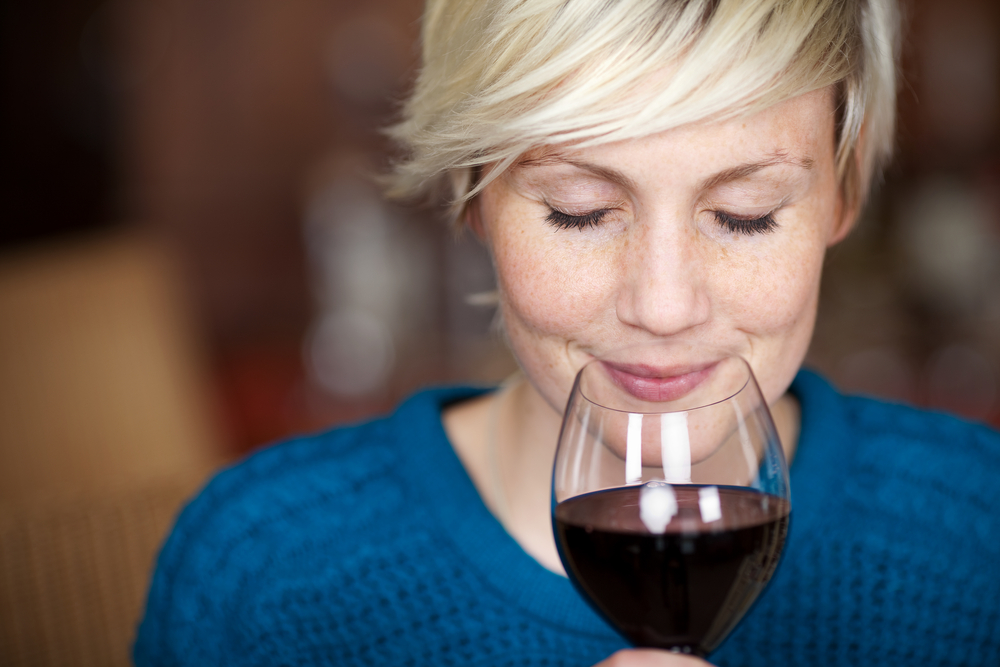 60 Things to do Before 60.
Closeup portrait of young female customer drinking red wine with eyes closed